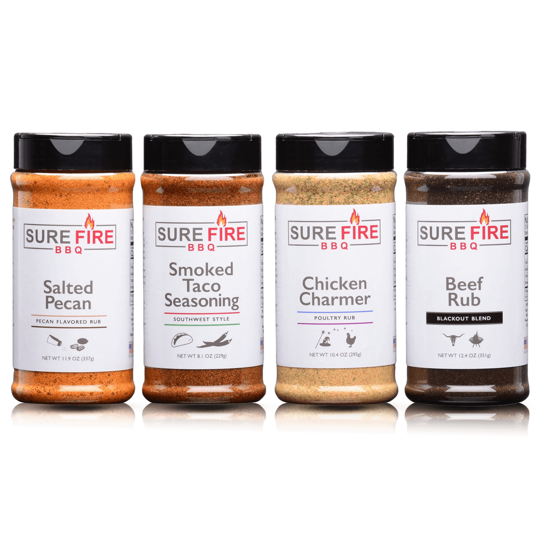 A four-pack of SureFire BBQ Spice blends, including Salted Pecan, Smoked Taco Seasoning, Chicken Charmer, and Beef Rub, arranged side by side.