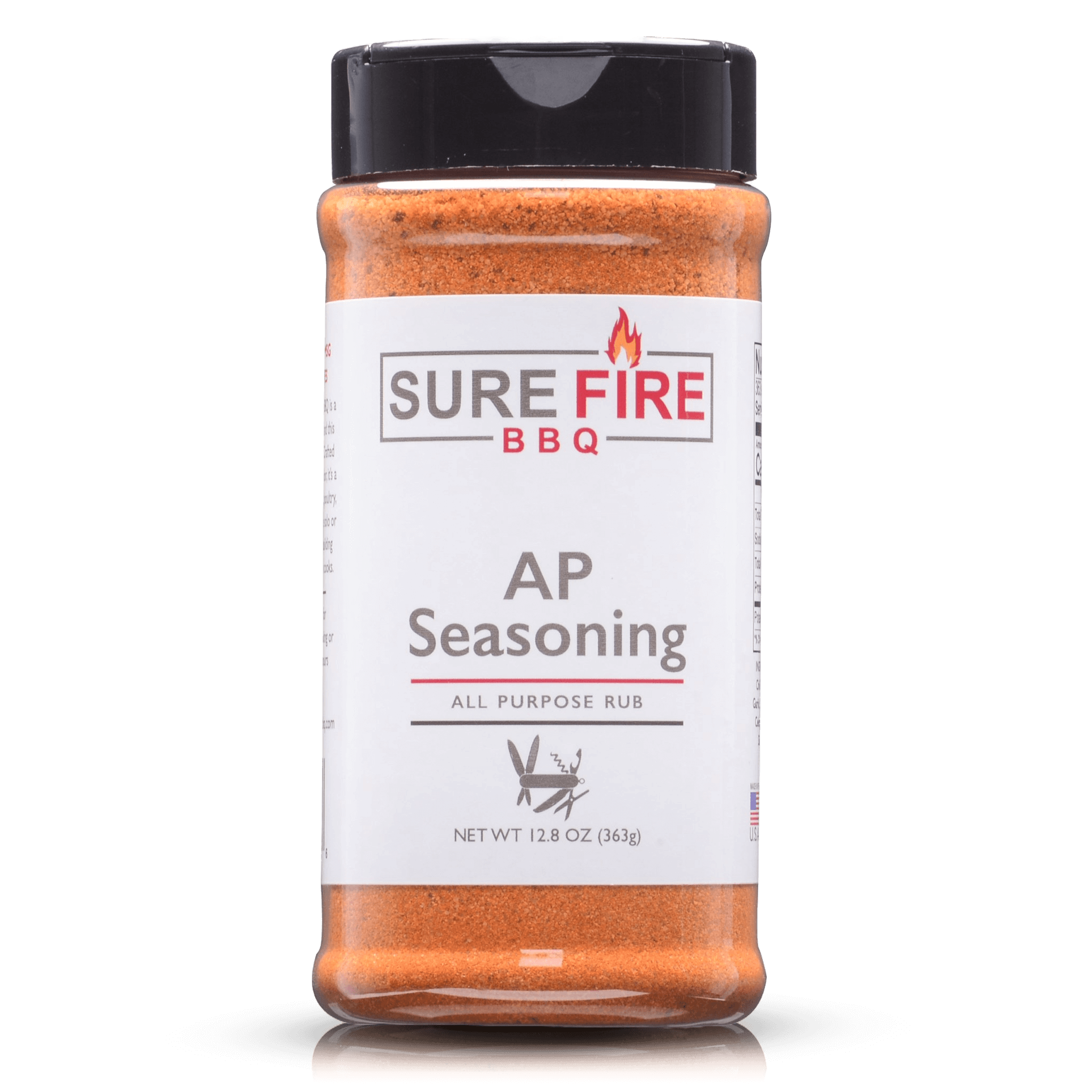 A bottle of Sure Fire BBQ AP Seasoning All Purpose Rub, 12.8 oz, featuring a black cap and a white label with red and gray text.