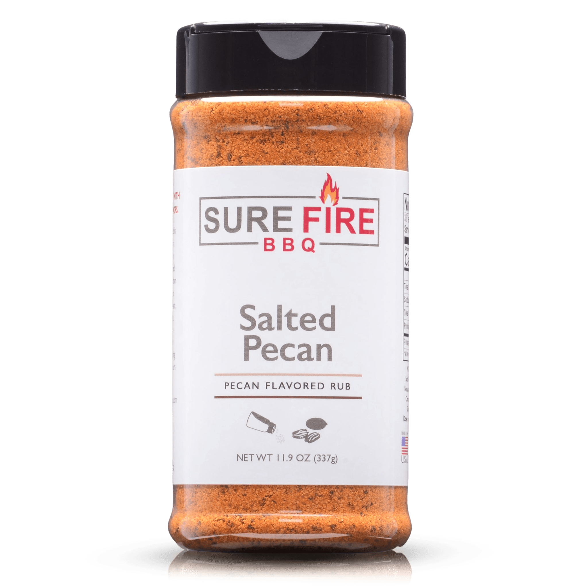 A bottle of Sure Fire BBQ Salted Pecan Rub, 11.9 oz, featuring a black cap and a white label with red and gray text, ideal for adding a savory and mildly sweet pecan flavor to various meats and vegetables.