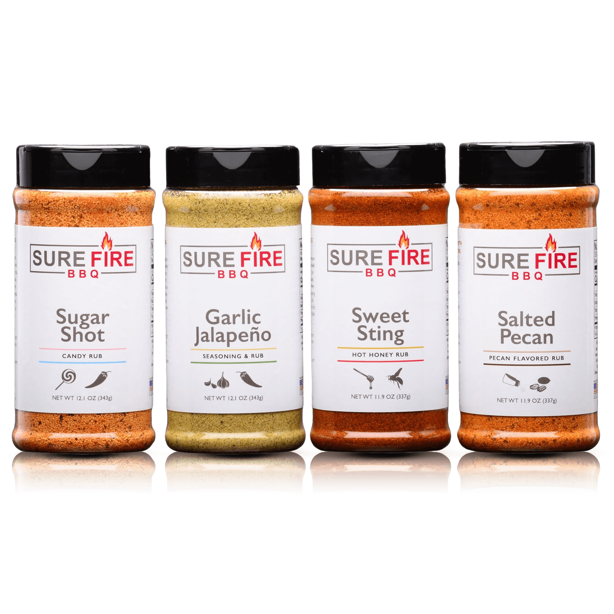 Four-pack of Sure Fire BBQ seasonings including Sugar Shot, Garlic Jalapeño, Sweet Sting, and Salted Pecan in bottles with labels.