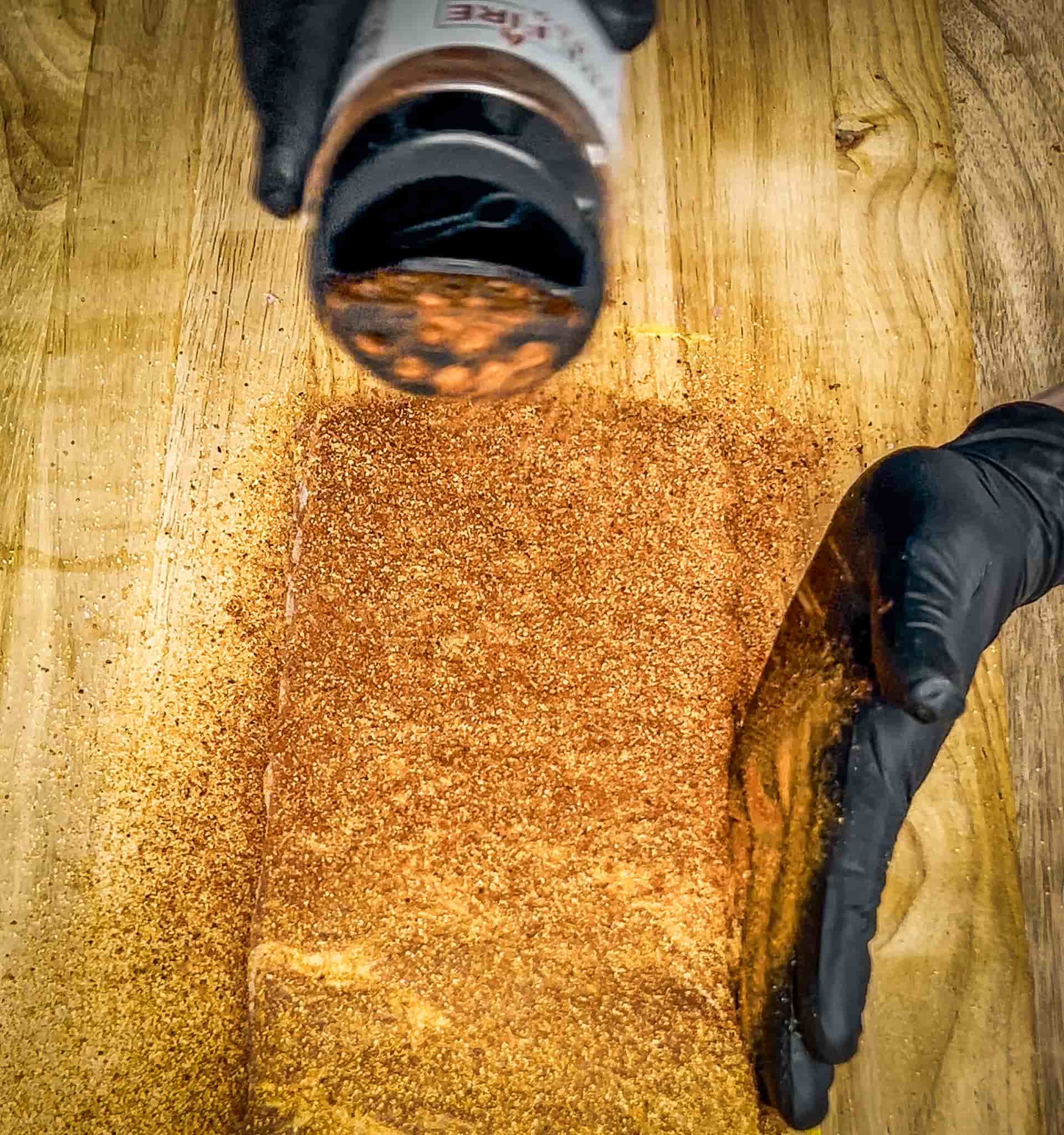 Baby Back Ribs coated with a mustard binder and seasoned with layers of Sure Fire BBQ AP Seasoning and Sweet Sting rubs